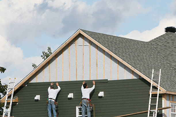 Professional Siding Installation technician working in Windber, PA